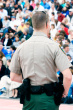 stock-photo-4026922-back-of-police-officer-working-crowd-control-at-track-event